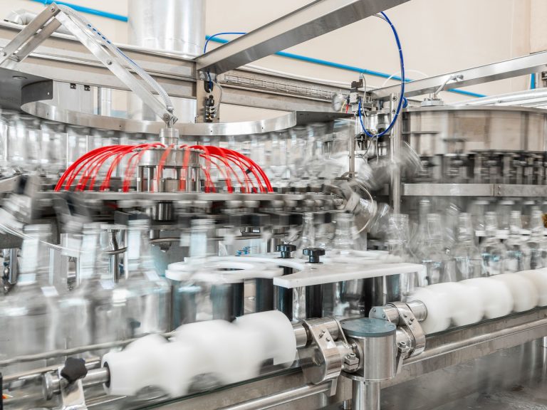 Macchina industriale automatica imbottiglia per efficienza operativa nella produzione.